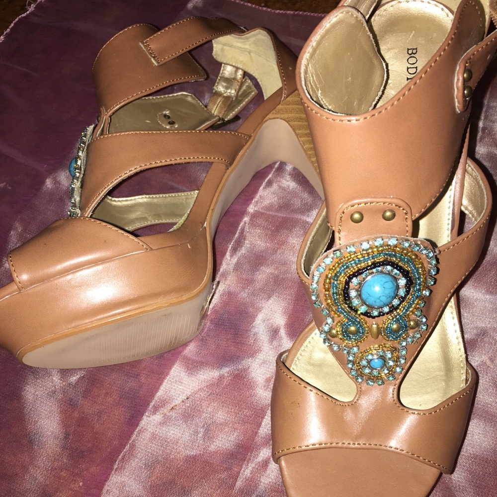 Body central brown pumps